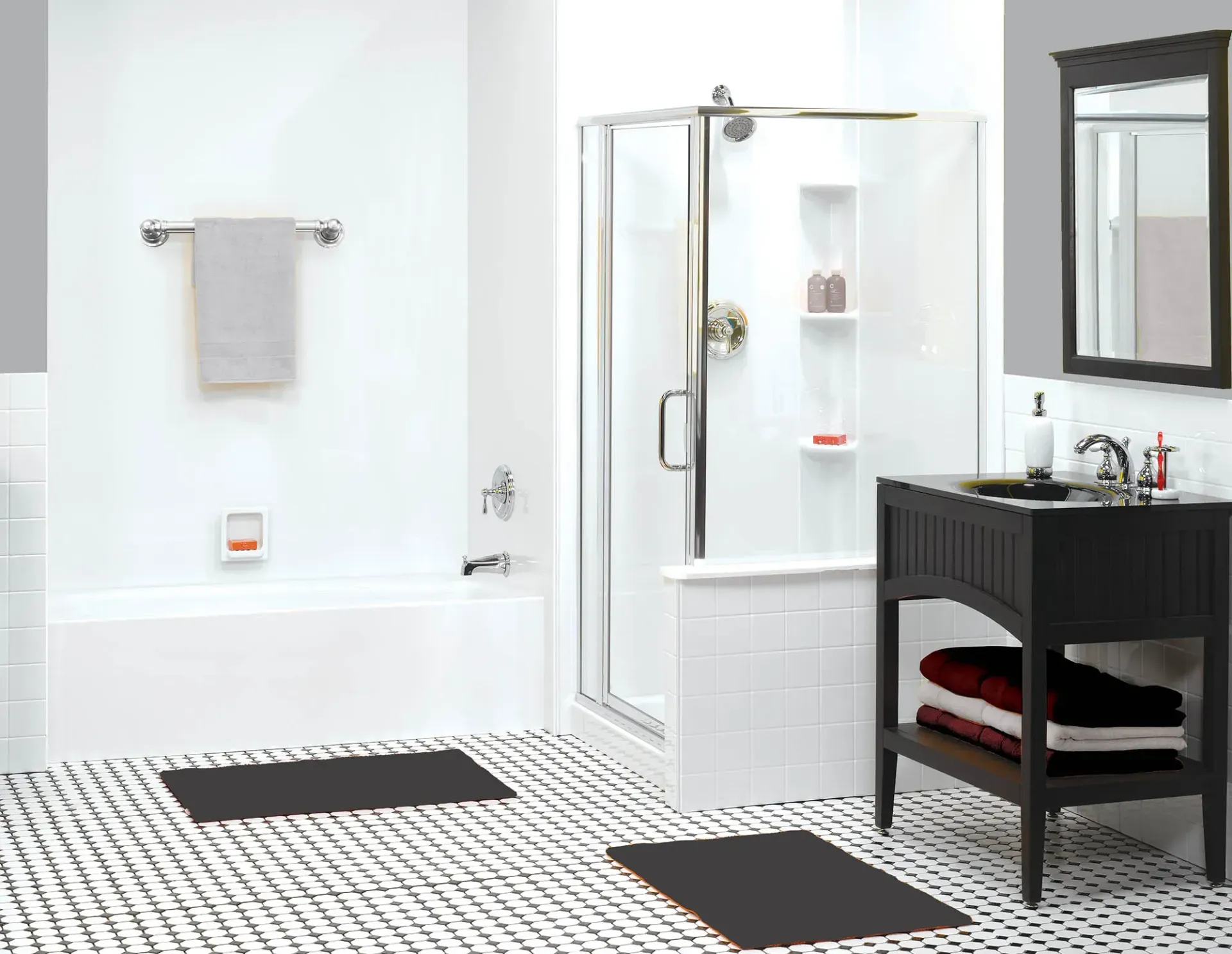 Modern white bathroom with shower, black vanity, wall mirror, and patterned tile floor