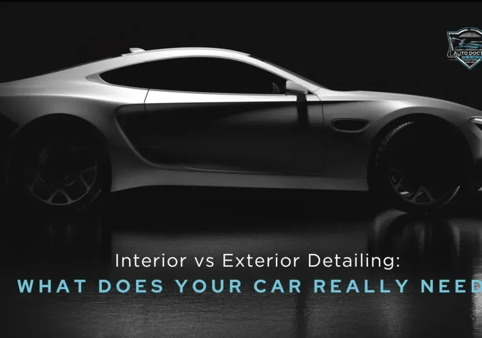 A silver sports car in a dark setting, with text overlay: