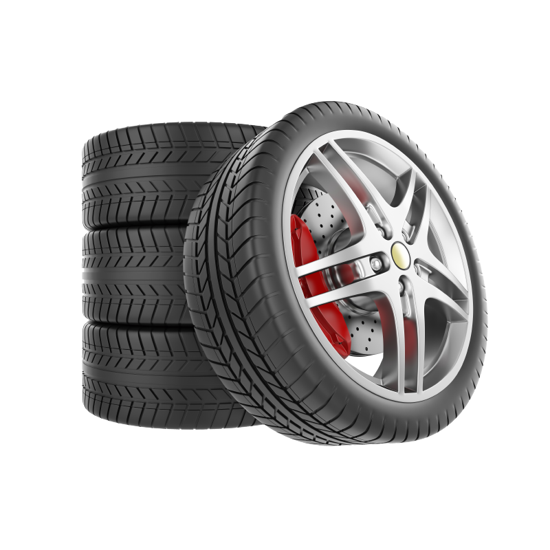 Four car tires stacked, one with a silver rim and red brake calipers.