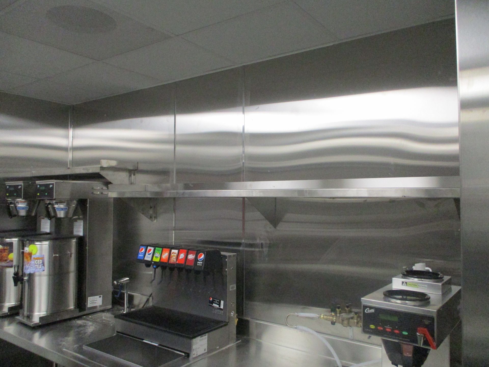 A Kitchen with Stainless Steel Appliances and a Coffee Maker | San Antonio, TX | Texas Sheet Metal