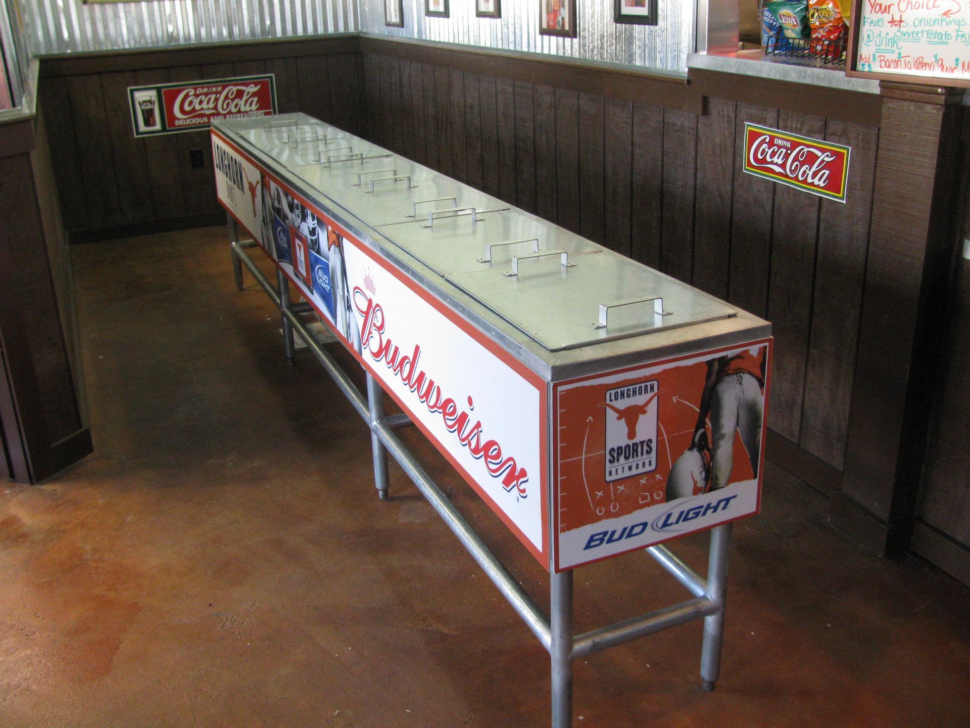 A Long Table With a Budweiser Advertisement on it | San Antonio, TX | Texas Sheet Metal