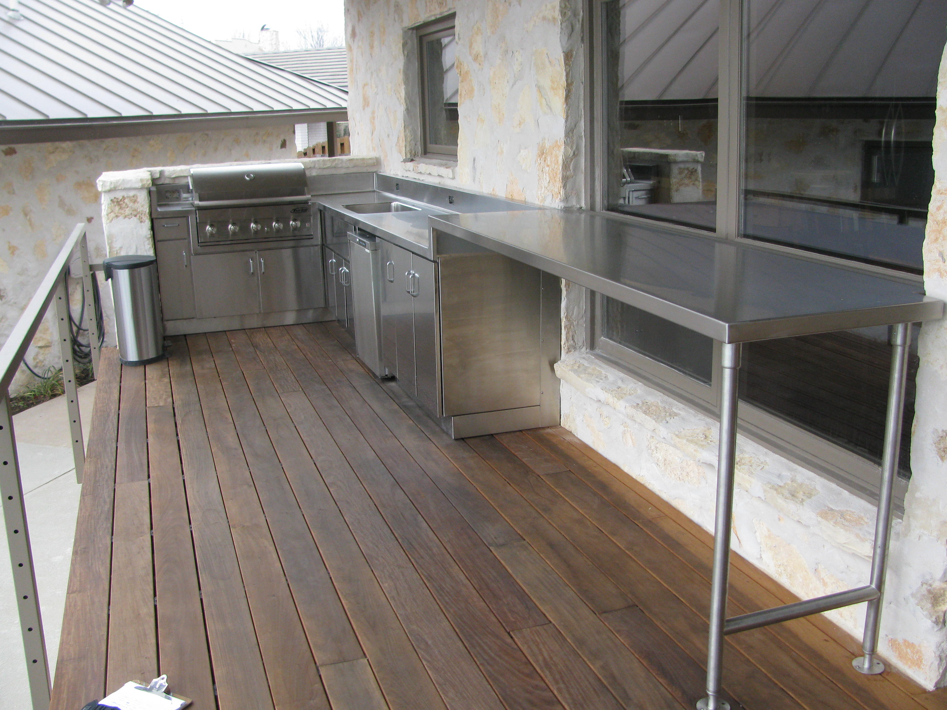 A Wooden Deck with a Stainless Steel Table | San Antonio, TX | Texas Sheet Metal