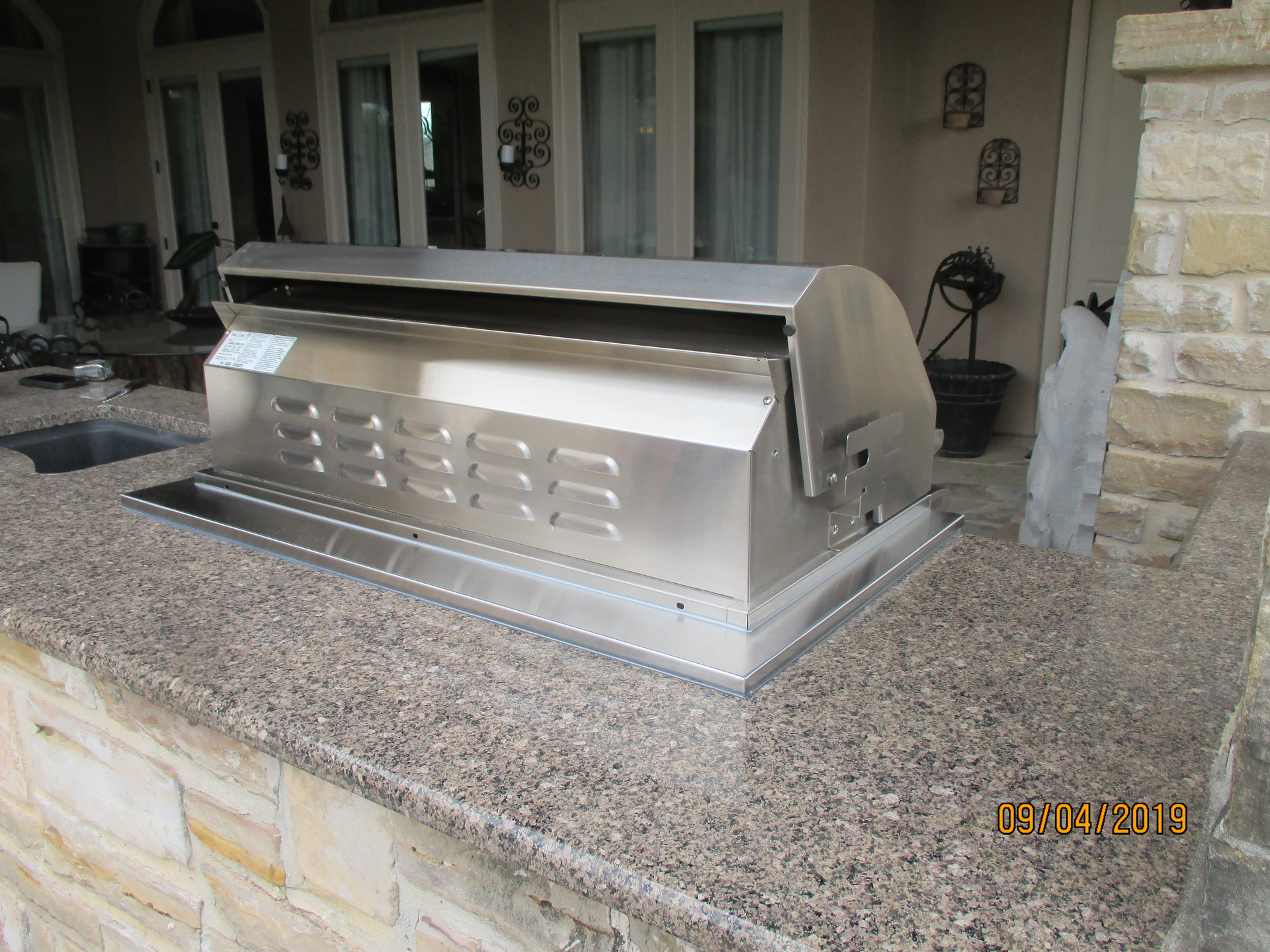 A Stainless Steel Grill is Sitting on a Granite Counter Top | San Antonio, TX | Texas Sheet Metal