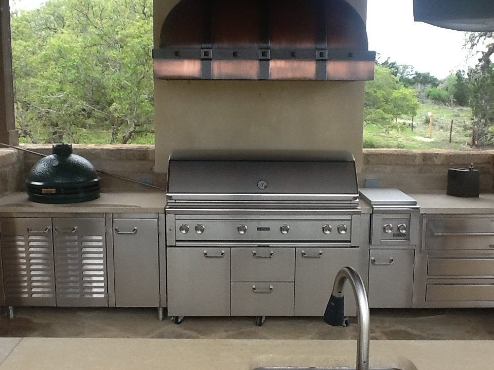 An Outdoor Kitchen with Stainless Steel Appliances and a Green Egg | San Antonio, TX | Texas Sheet Metal