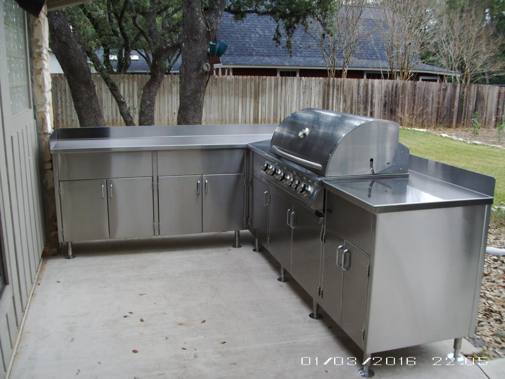 A Stainless Steel Outdoor Kitchen with a Grill and Cabinets | San Antonio, TX | Texas Sheet Metal