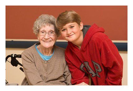 boy with senior smiling, first eden certified long term care facilities in new brunswick