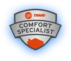Trane Comfort Specialist badge, silver and orange, with a house silhouette and the Trane logo.