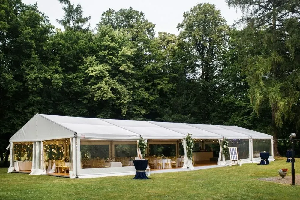 A Large White Tent is Sitting in The Middle of a Grassy Field — Event Hire in Wodonga, NSW