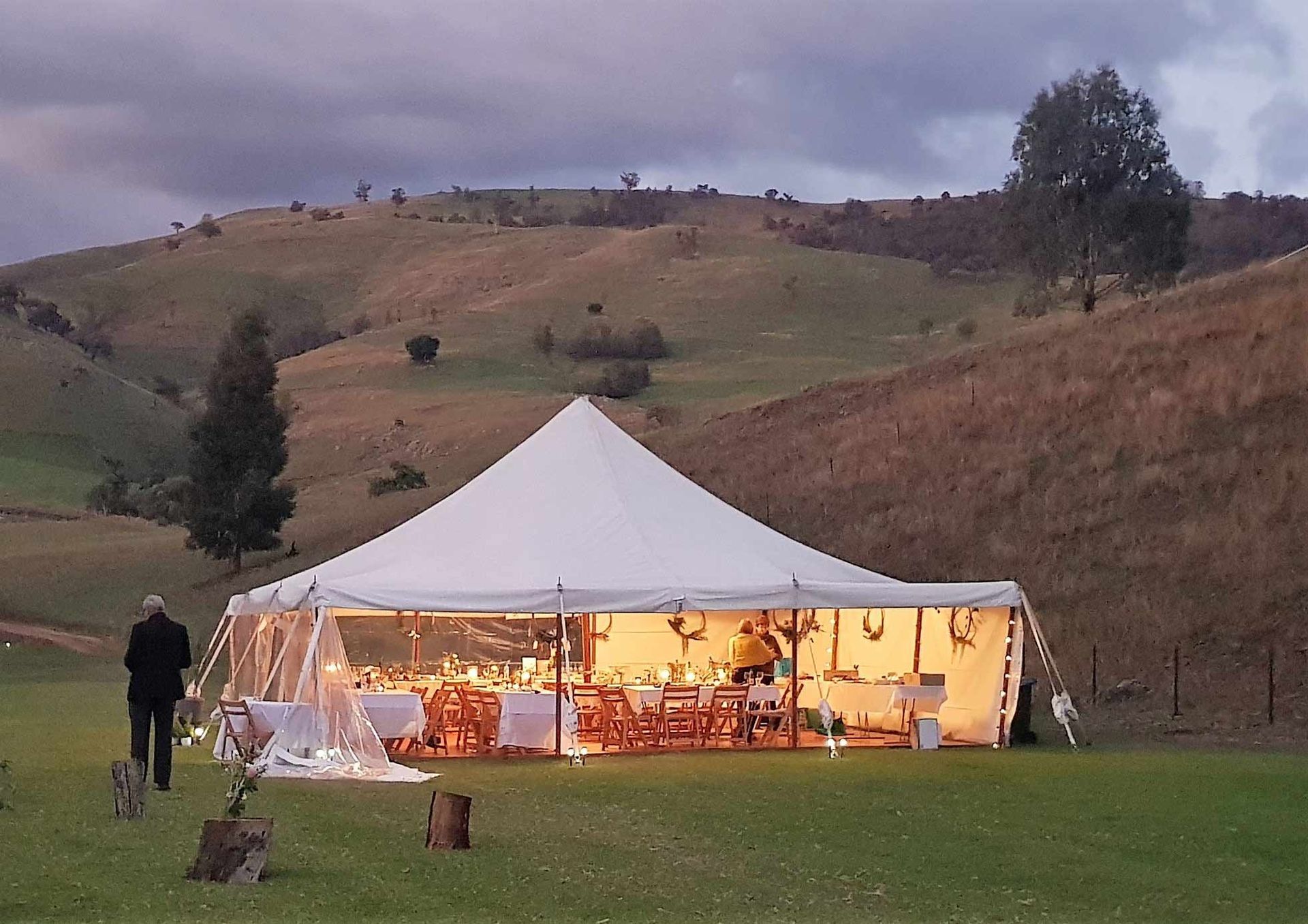 A Row of White Tents are Mounted on Top of a Lush Green Field — Event Hire in Wodonga, NSW