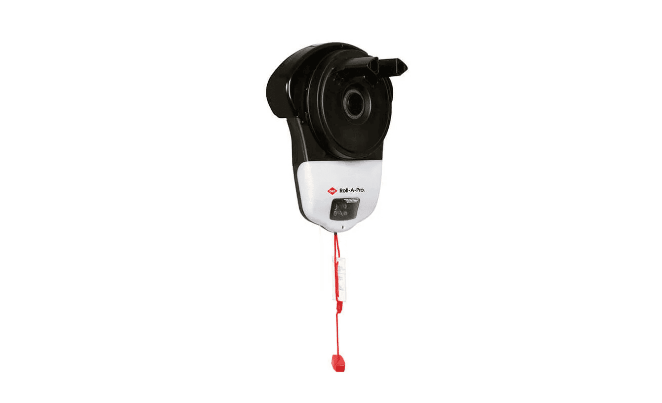 A black and white device with a red cord attached to it.