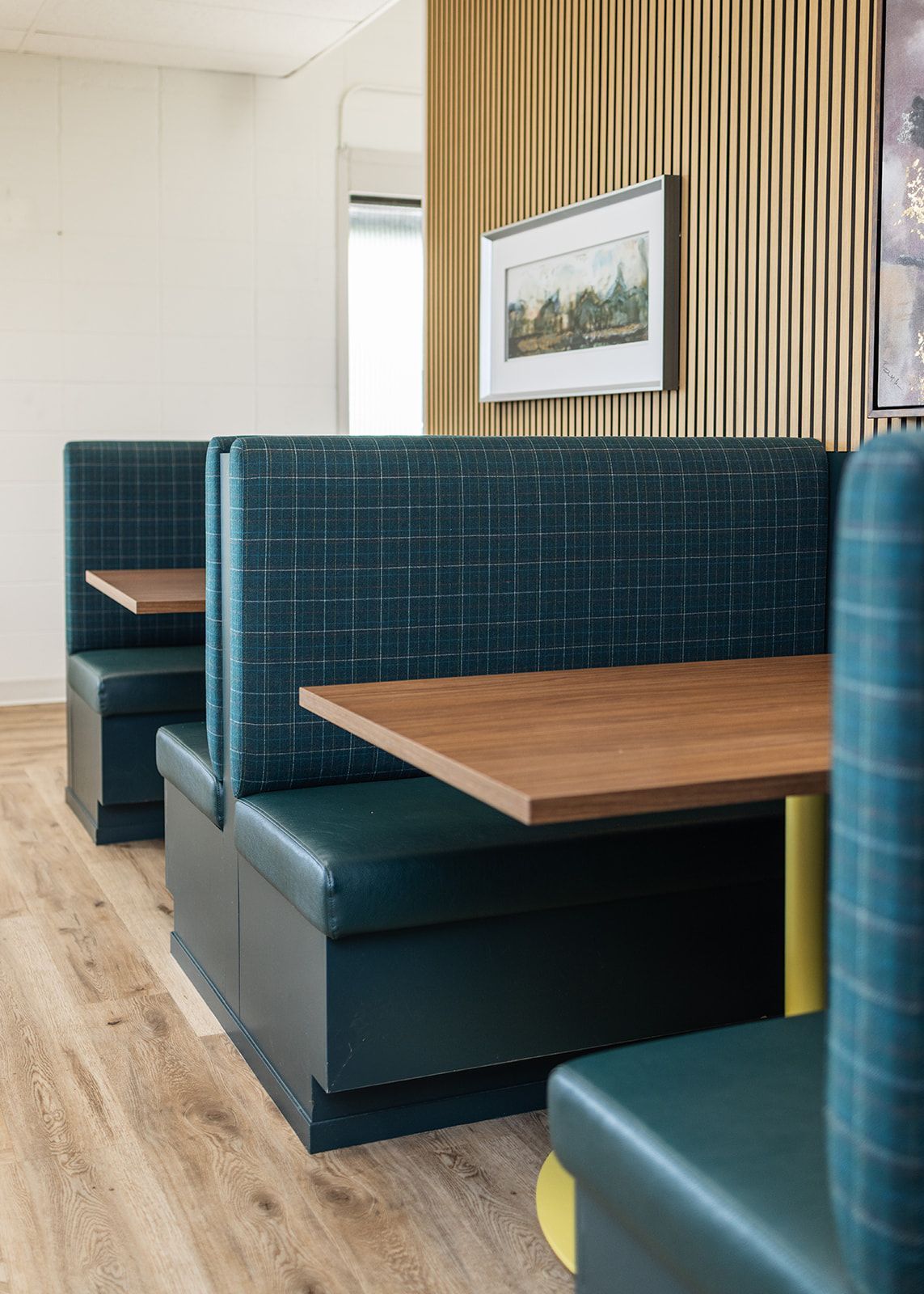 Curated retail space in the Brock Golf Clubhouse featuring optimized product displays, custom furniture, and finishes designed to enhance the shopping experience while reflecting the club’s welcoming and cohesive aesthetic.”