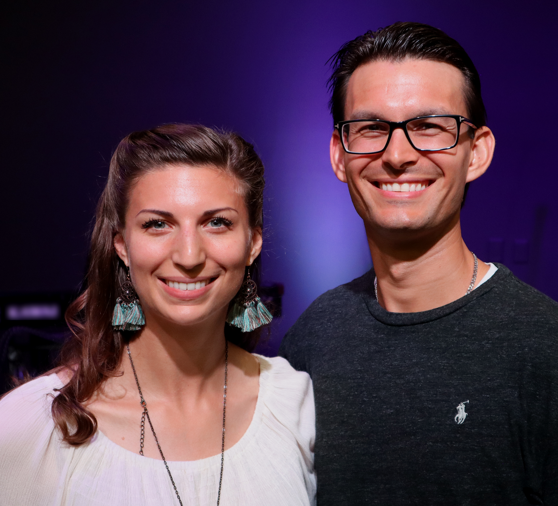 A man and a woman are posing for a picture together