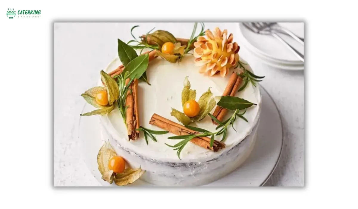 autumn birthday cake decorated with dried leaves and cinnamon sticks