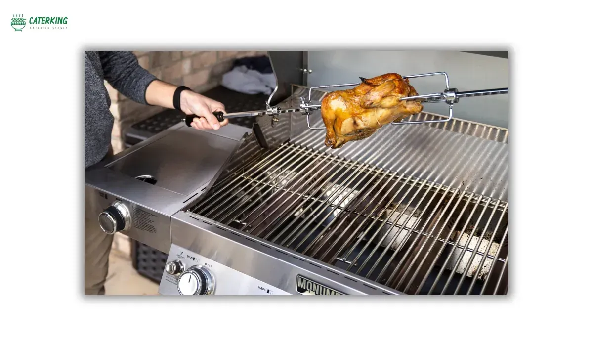 mounting a whole chicken onto a rotisserie spit