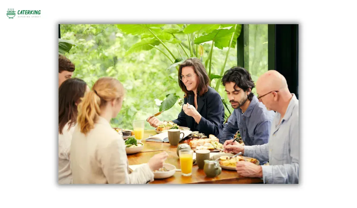 office team enjoying a catered breakfast meeting