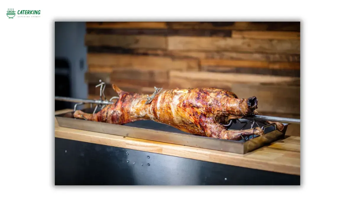 resting and carving spit roast lamb to retain juices before serving