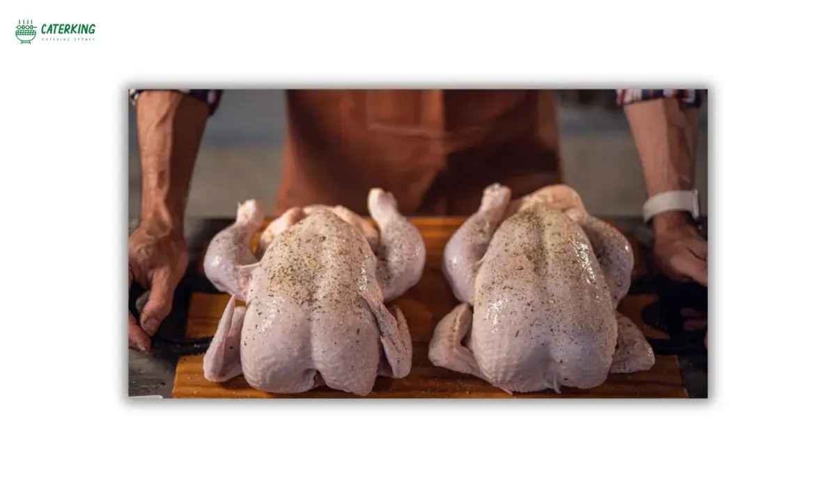 whole chickens of different weights prepared for rotisserie cooking