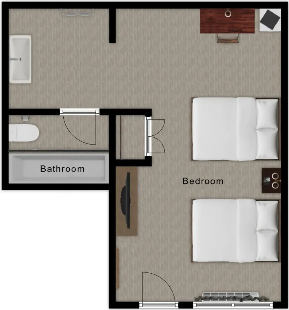 Floor plan of a studio apartment: bedroom, kitchenette, bathroom, and entrance area.