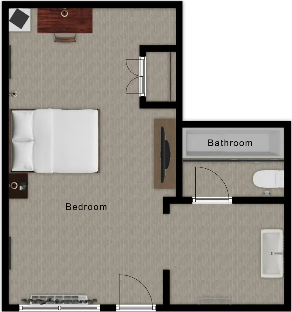 Floor plan of a hotel room with bathroom, two beds, a desk, and a television.