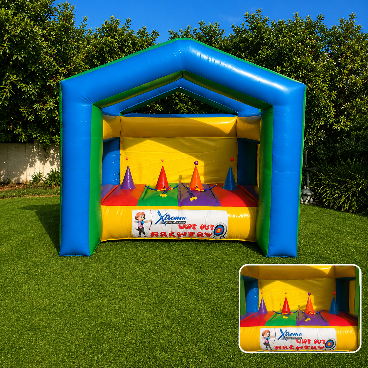 A colorful bouncy house with a sign that says xtreme