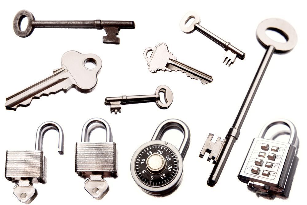 A bunch of keys and a padlock with the number 20 on it — Locksmith in Southport, QLD
