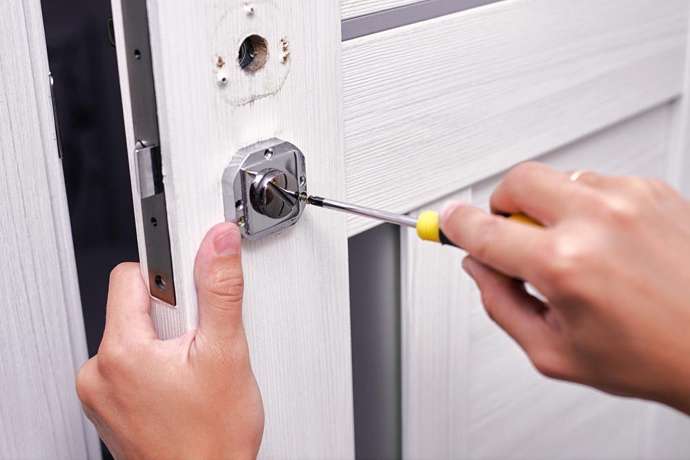 Upgrading A Lock By A Locksmith On The Goldcoast