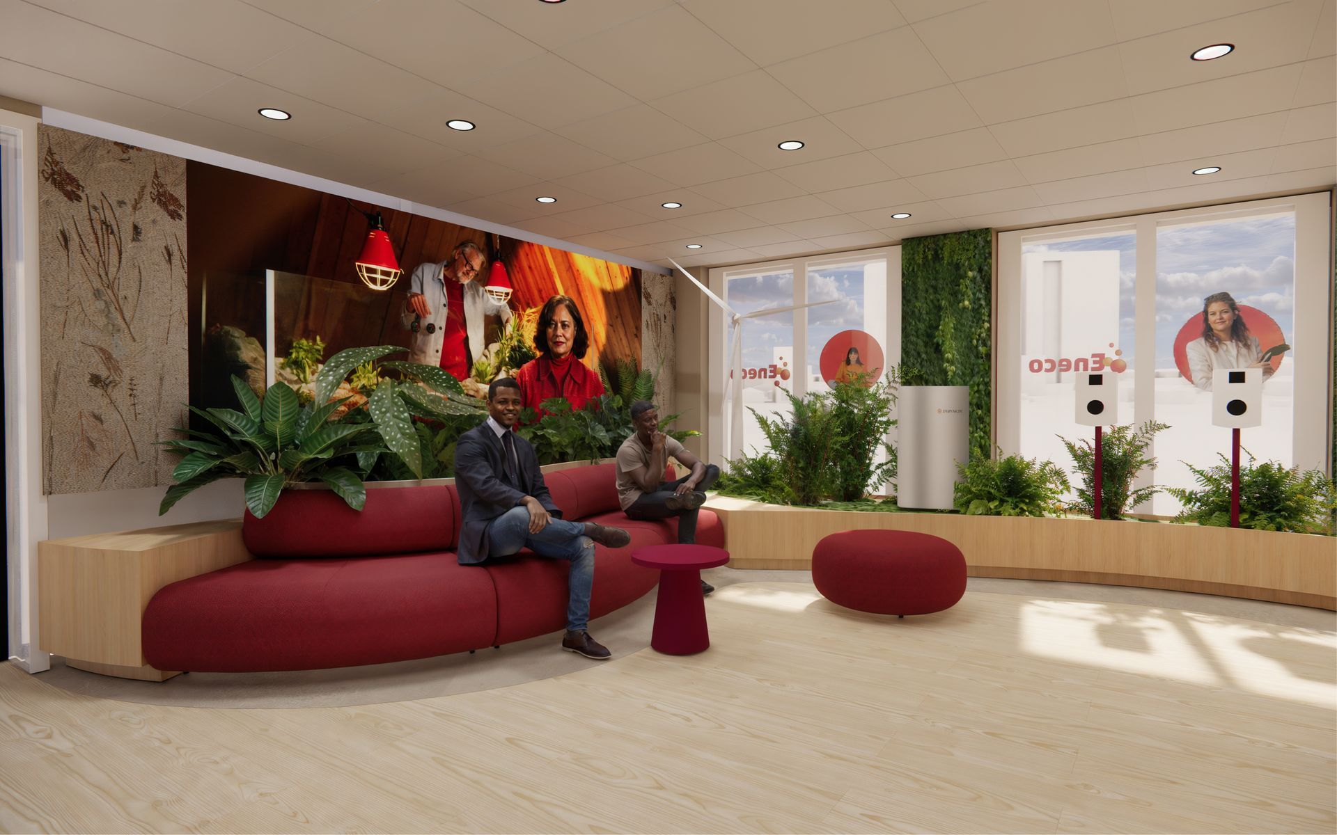 Moderne kantoorlobby van Eneco Belgium met rode zitmeubels, potplanten, kunst aan de muur en een persoon die op een bankje bij grote ramen zit.
