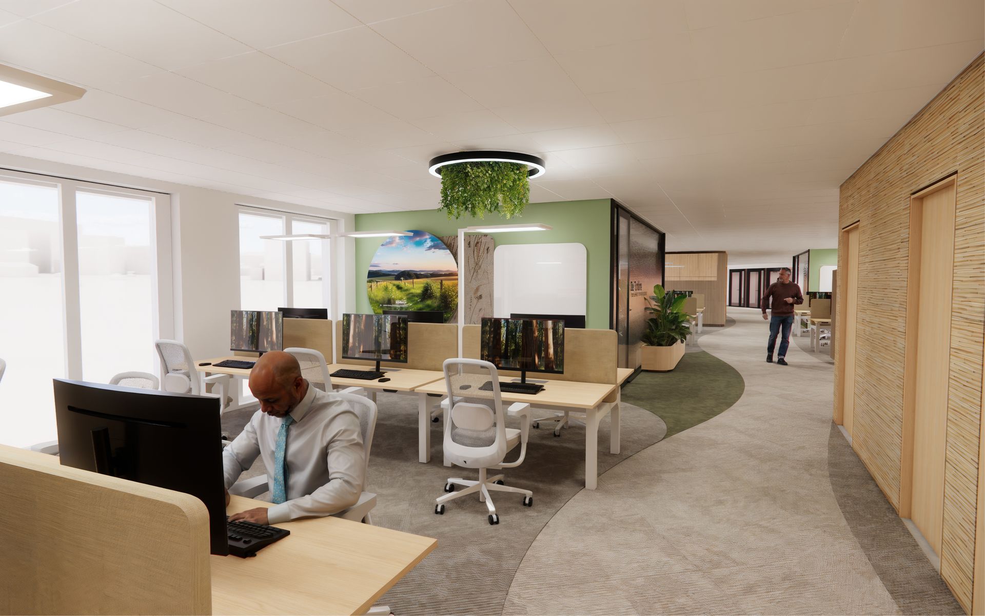 Modern open kantoor van Eneco Belgium met bureaus, stoelen, computers en een loungeruimte waar mensen werken.