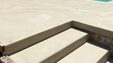 Liquid limestone around pool and under patio