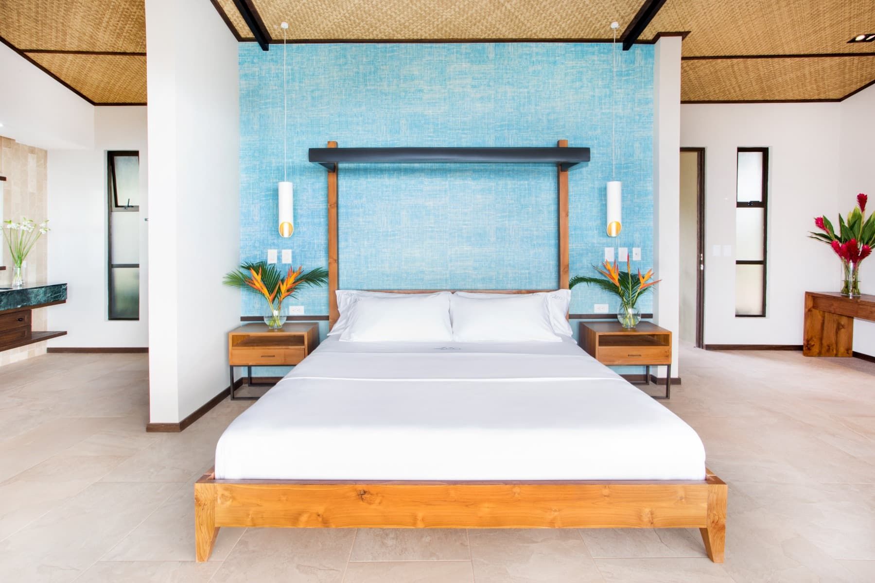 There is a large bed in the middle of the room.