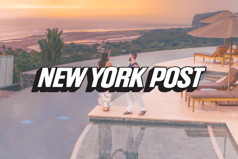 A couple standing next to a swimming pool with the new york post written on the bottom