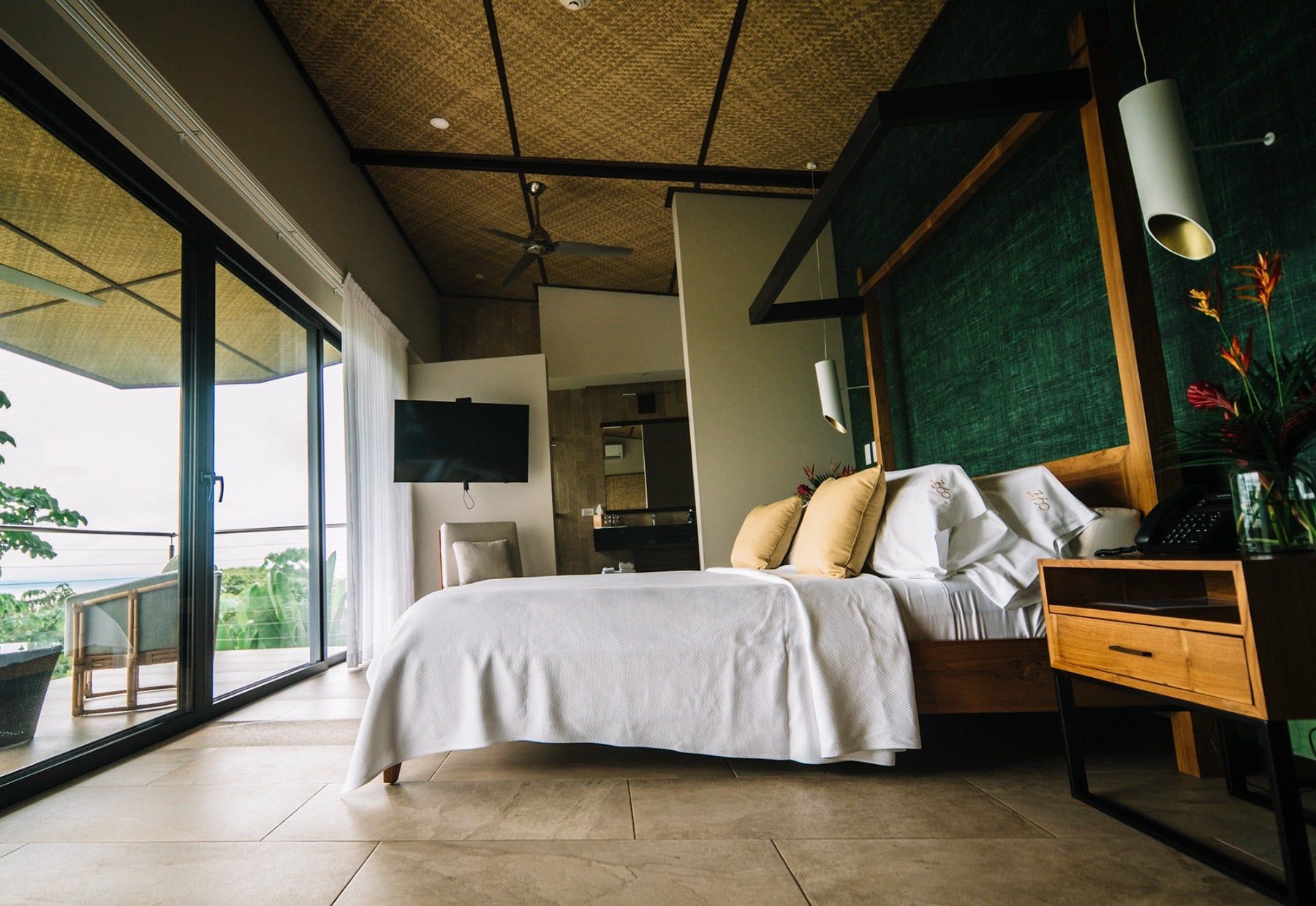 There is a large bed in the middle of the room.