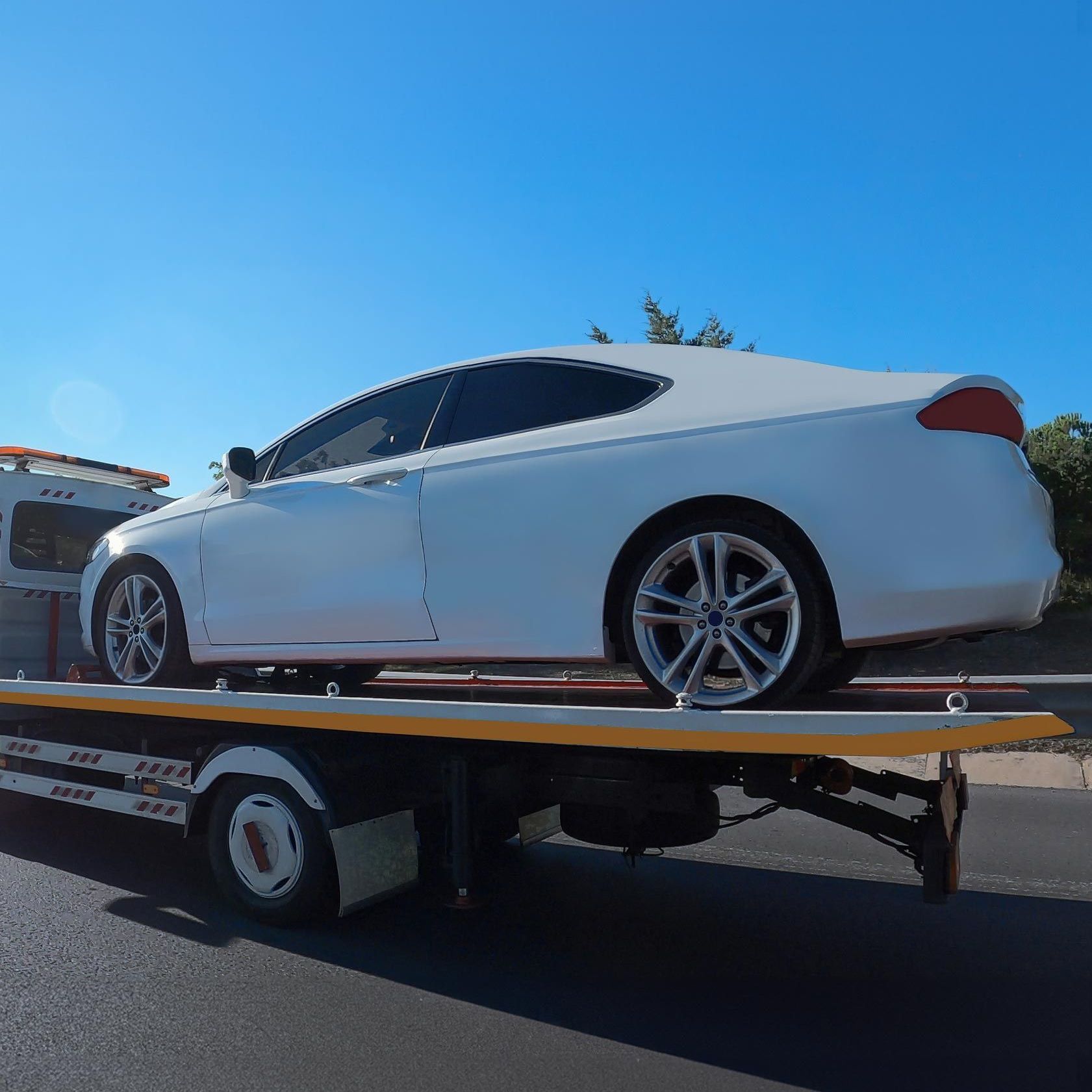 Towing White Car — O'Fallon, MO — O'Fallon Garage Towing White Car — O'Fallon, MO — O'Fallon Garage