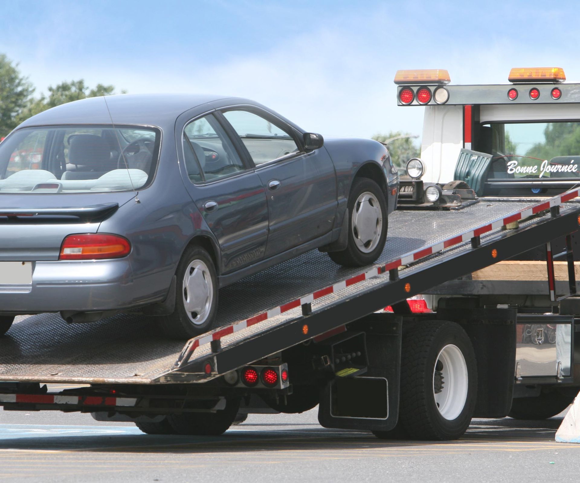 Car Being Towed — O'Fallon, MO — O'Fallon Garage Car Being Towed — O'Fallon, MO — O'Fallon Garage