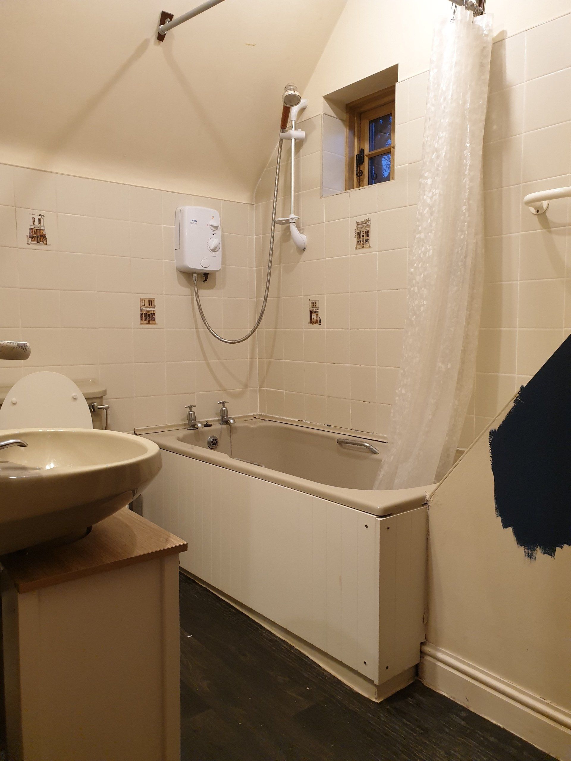 Dark, outdated bathroom