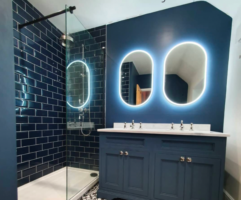 Blue themed shower with brick tiles