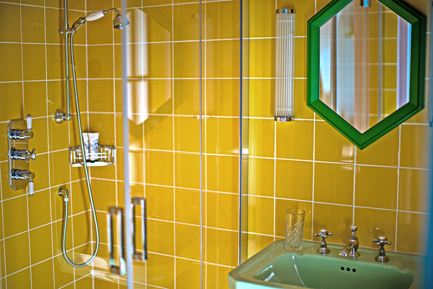 Modern yellow tiled bathroom