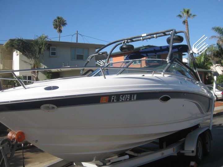 A white boat with florida license plate fl 5429 ln