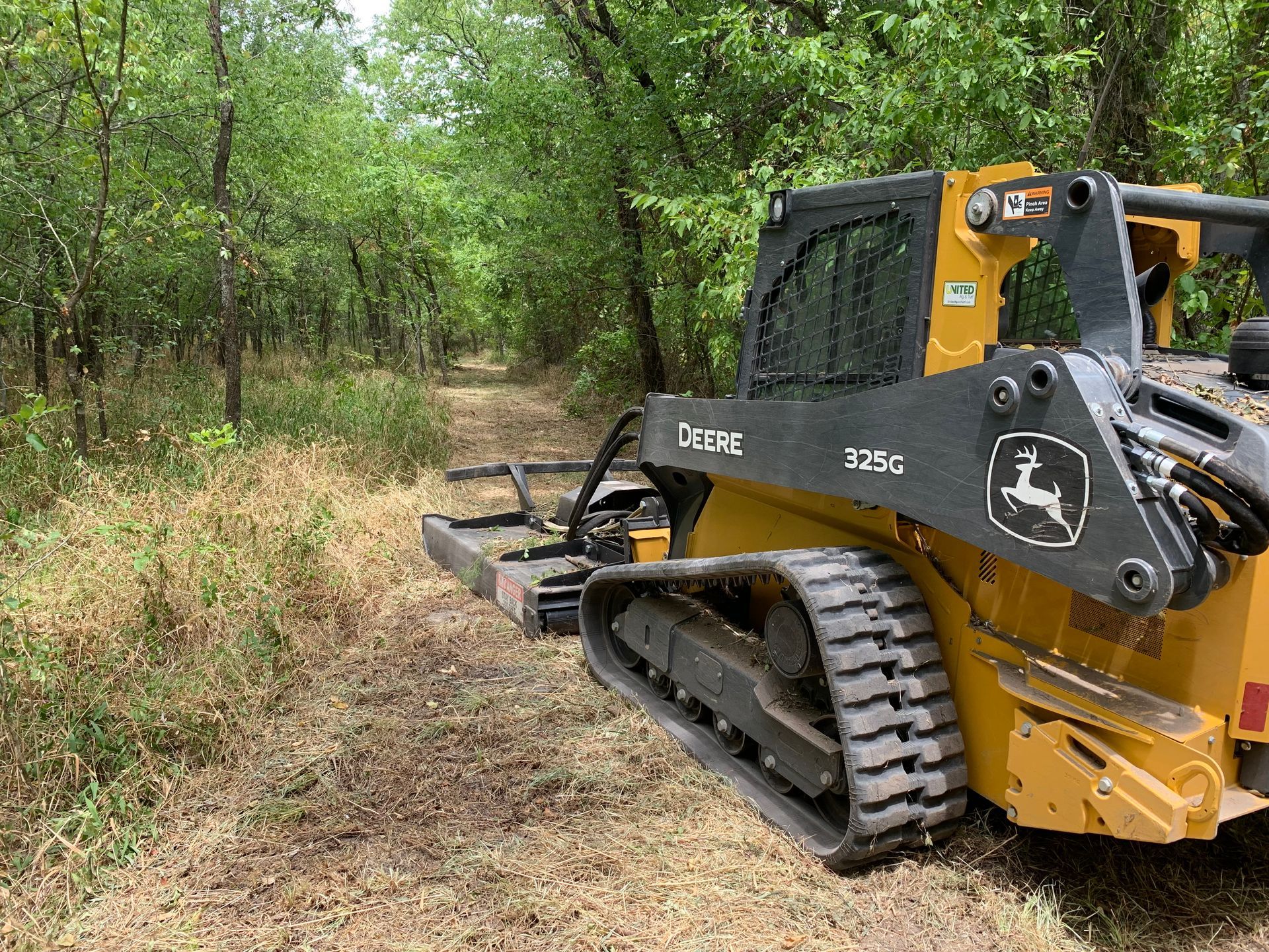 Brush cutting, land clearing and trail clearing.