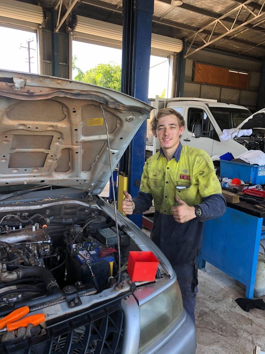 A Man Is Standing In Front Of A Car With The Hood Open And Giving A Thumbs Up — TBR Mechanical in East Arm, NT