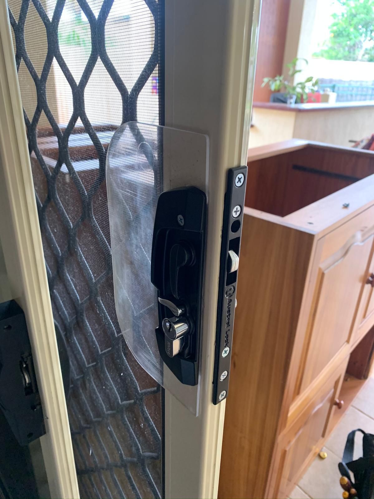 White Window Handle With Two Keys — Cairns Locksmiths in Edmonton, QLD