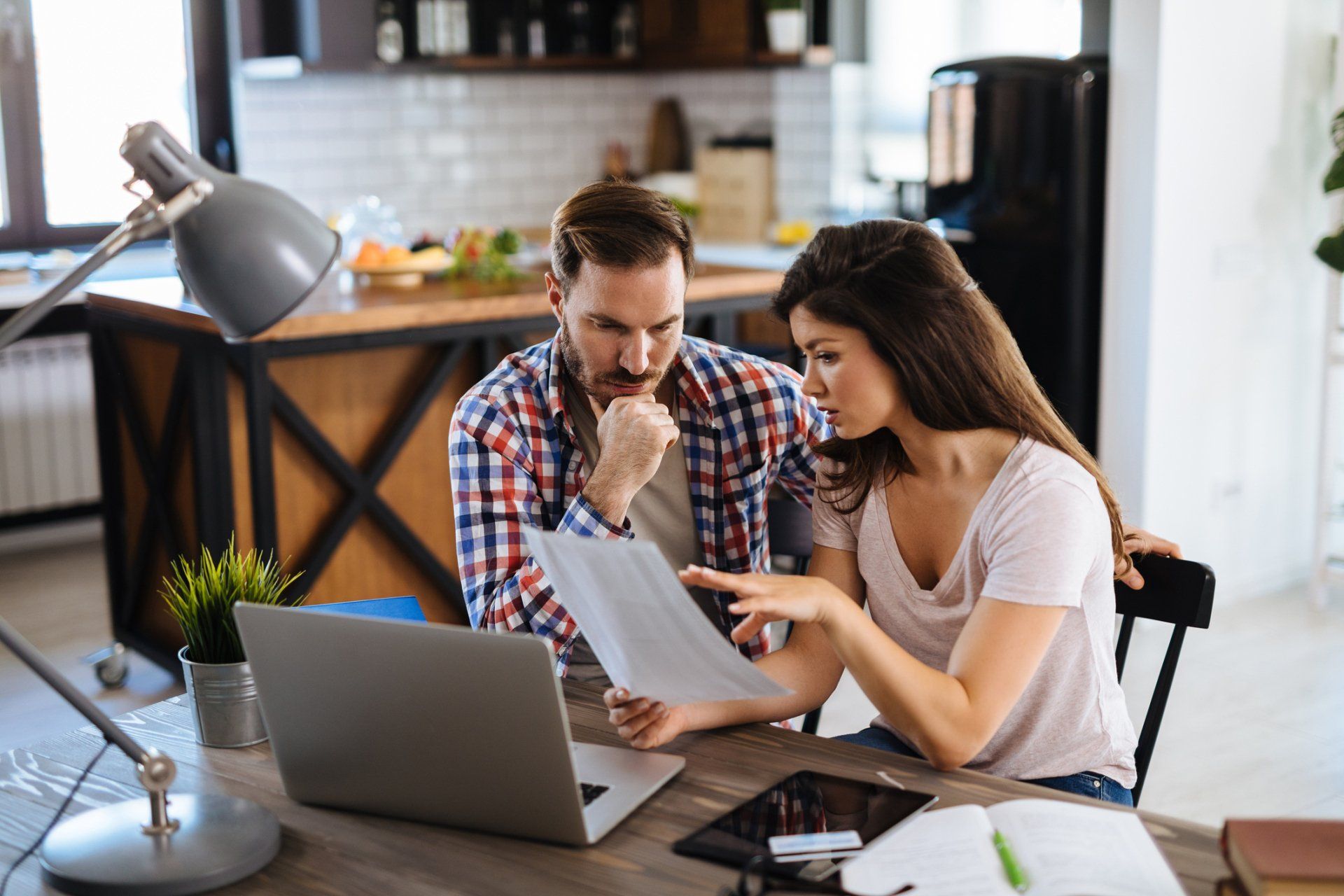 Couple Discussing Bankruptcy — Utica, NY — Murad And Murad, P.C. Couple Discussing Bankruptcy — Utica, NY — Murad And Murad, P.C.