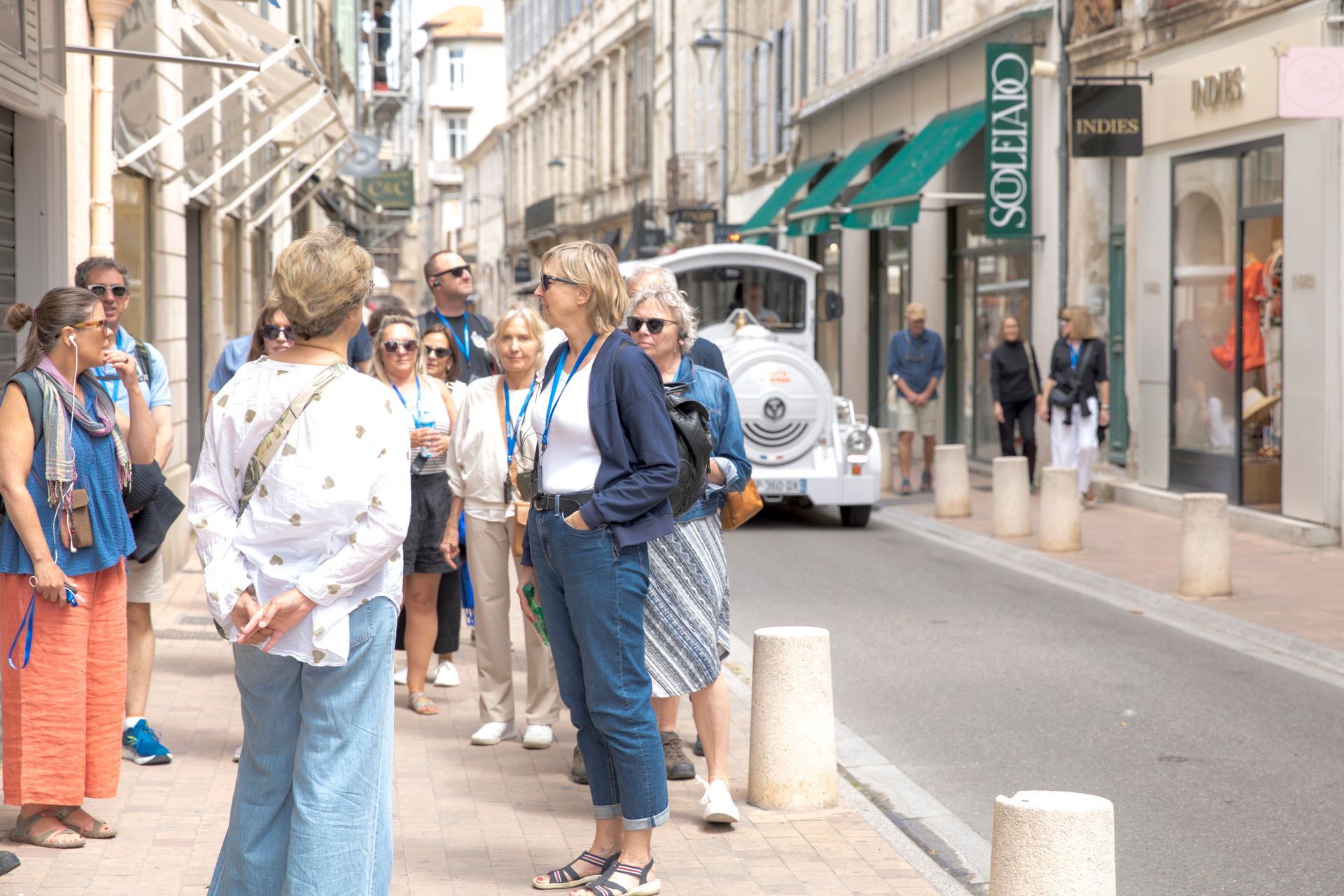 Walking through the streets of Avignon historic center with our certified tour guide