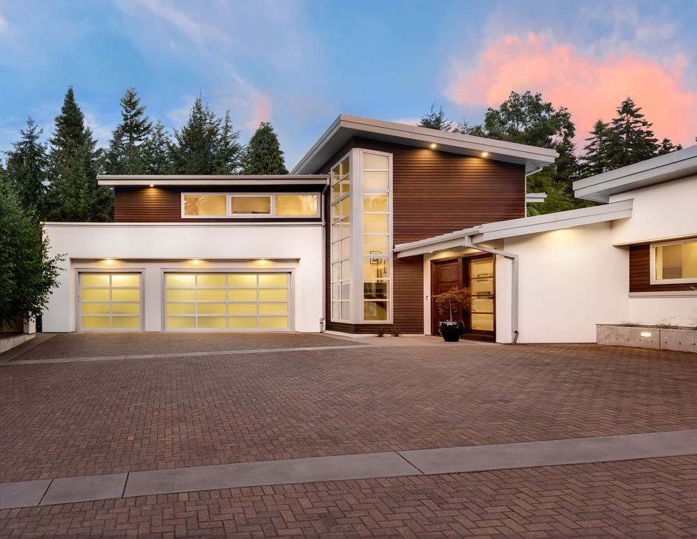 Modern House With Brown Siding — Peterson Property Valuations Brisbane in Logan, QLD