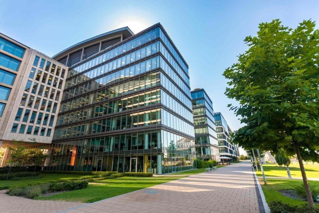Modern Glass Office Buildings — Peterson Property Valuations Brisbane in Caloundra West, QLD