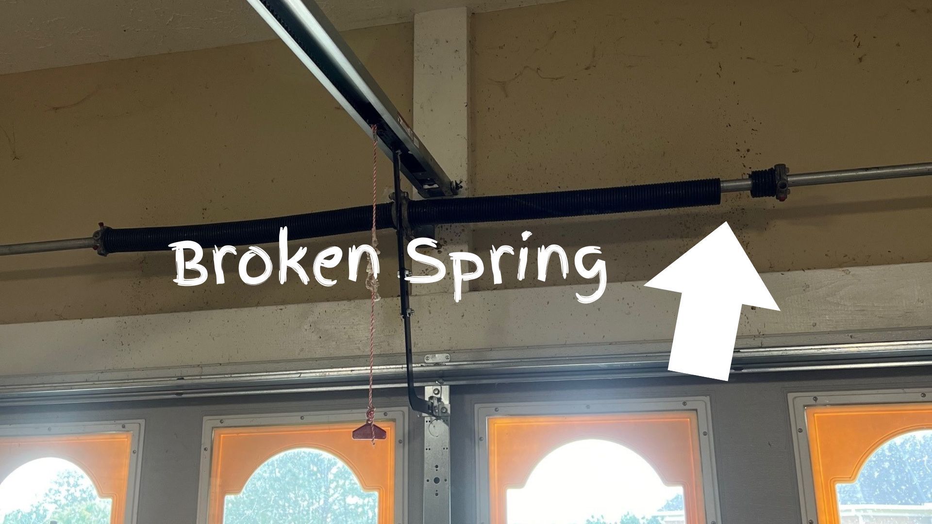 broken garage door spring