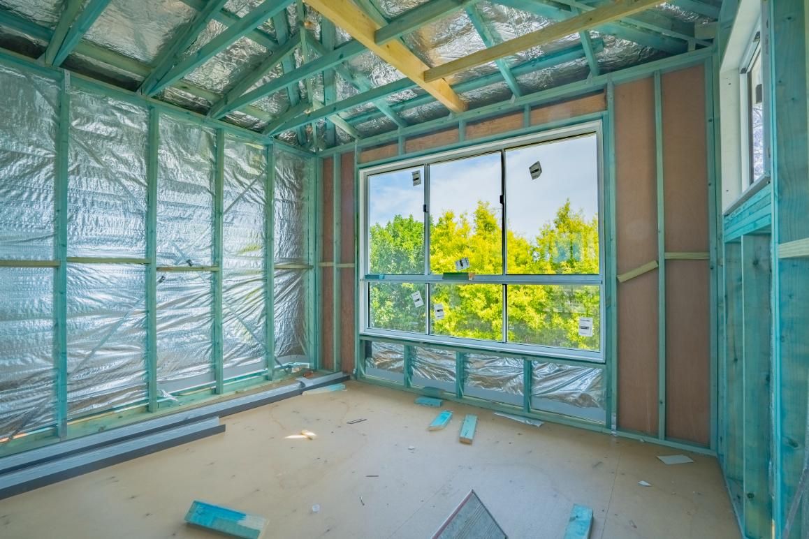 Wooden Frame is wrapped in Plastic surrounded by Wooden Framing — Jonobilt in Bolwarra, NSW