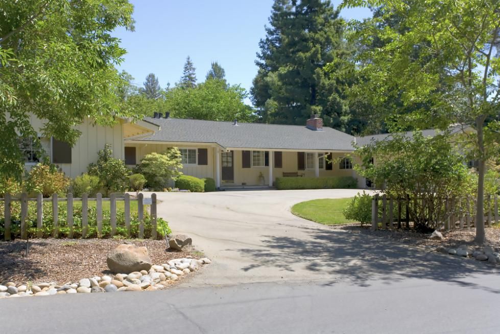A House with A Driveway and A Fence in Front of It — Jonobilt in Warners Bay, NSW