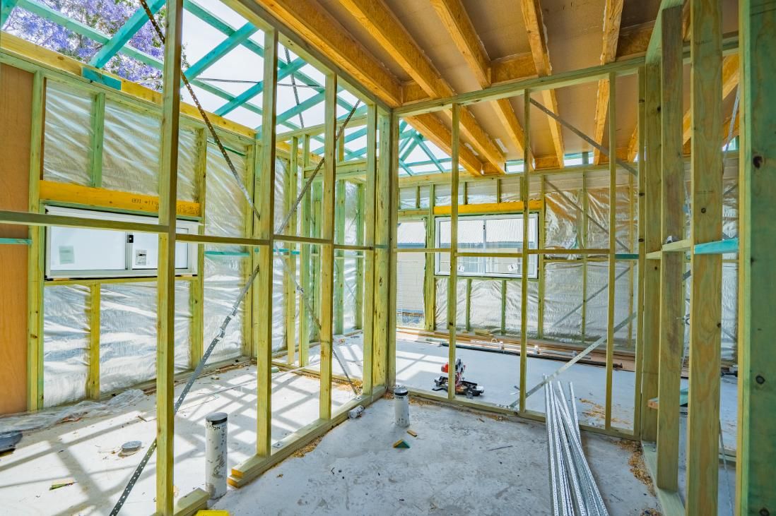The Inside of A Building Under Construction with Wooden Frames — Jonobilt in Kotara, NSW