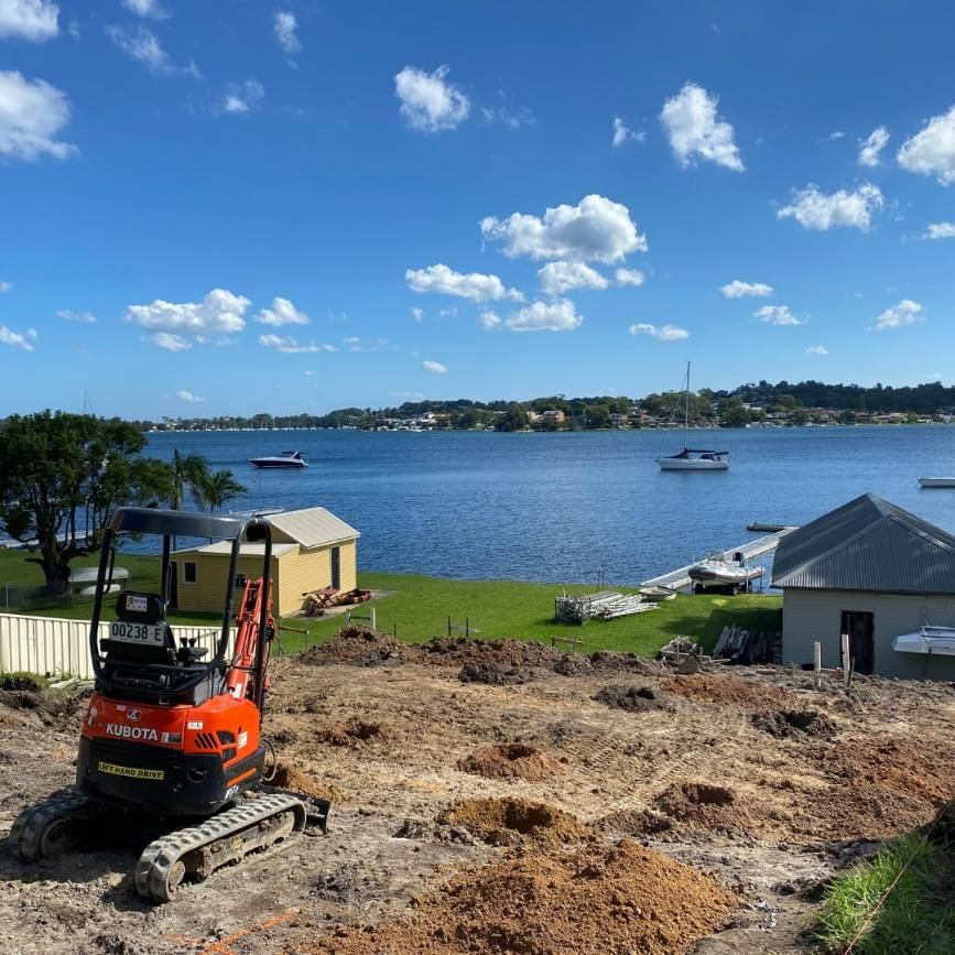 A Construction Site with A Large Body of Water in The Background — Jonobilt in New Lambton, NSW